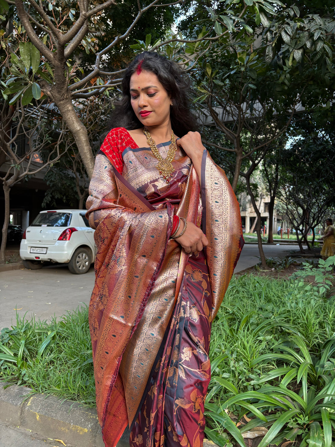 Majestic Maroon Banarasi Silk Saree with Golden Floral Weave