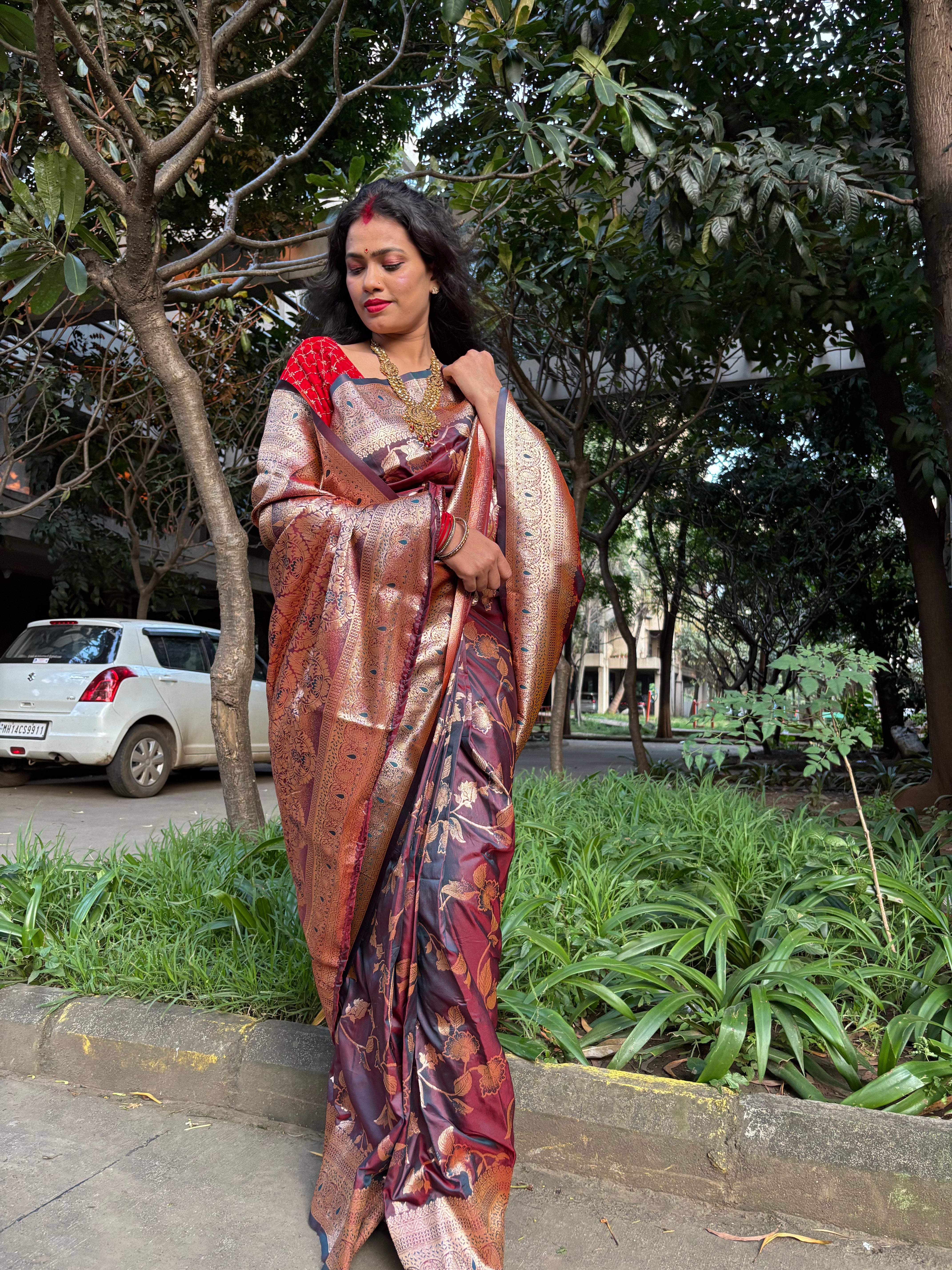 Majestic Maroon Banarasi Silk Saree with Golden Floral Weave